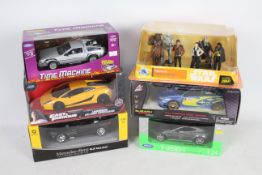 Welly - Jada - Nex - Disney - 6 boxed models including Mercedes Benz SLR McLaren in 1:24 scale,