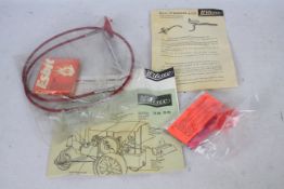 Wilesco - An unused Wilesco steam tractor accessory bag containing the driving wheel and cable,