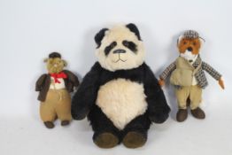 Hovvig - Lot includes a Hovvig panda with glass eyes, poly nose, suede paws,