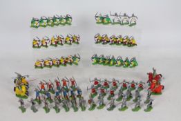 Britains Herald - A collection of 77 Knight figures, 4 on horseback, 73 on foot or kneeling.