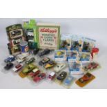 Corgi - Solido - Lledo - A collection of 32 x boxed / carded cars,