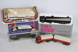 Tekno, NZG, Siku, Louis Surber - Five boxed European diecast model trucks.