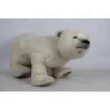 Bayside Bears - A large polar bear by Mary Lou Foley - The polar bear has glass eyes, poly nose,