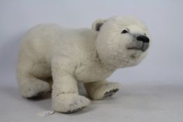 Bayside Bears - A large polar bear by Mary Lou Foley - The polar bear has glass eyes, poly nose,