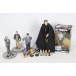 SD Toys - Headliners - RWA - A collection of 11 Laurel and Hardy figures,