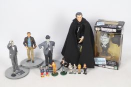 SD Toys - Headliners - RWA - A collection of 11 Laurel and Hardy figures,