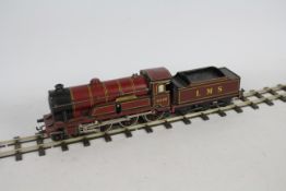 Bing - An O gauge clockwork Bing 4-6-0 Royal Scot loco in LMS maroon livery operating number 6508.