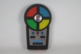 Pocket Simon - Handheld Light Sound Puzzle Game Toy - MB Electronics - 1980’s.