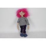 OOAK Cloth Dolls - A pink-haired doll with plastic eyes. Doll has a white and black striped jumper.