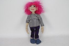 OOAK Cloth Dolls - A pink-haired doll with plastic eyes. Doll has a white and black striped jumper.