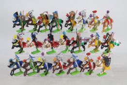 Britains - A collection of 22 Deetail Mounted Knights (made in England) They show light signs of