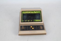 Caveman - Grandstand - Tomy Micro Computer Game. Jr.Caveman vs Dinosaur.