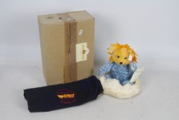 Steiff - A boxed white / blue mohair #00475 'Four Seasons Sun Beam 1997' - The bear has plastic