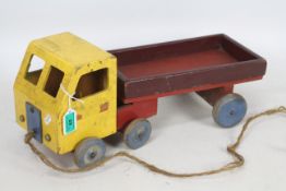 Unknown Maker - A large vintage wooden pull along 1940s style lorry,