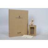 Steiff - A boxed miniature mohair 'Annual Gift 2003 Rose' bear - The white bear has plastic eyes,