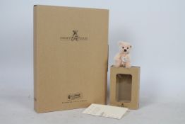 Steiff - A boxed miniature mohair 'Annual Gift 2003 Rose' bear - The white bear has plastic eyes,