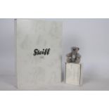 Steiff - A boxed miniature alpaca 'Annual Gift 2010' bear - The grey bear has plastic eyes,