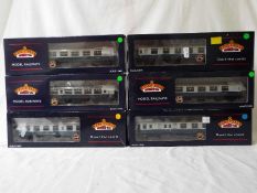 Bachmann - six OO gauge blue and grey corridor coaches, # 39-025A, 39-150, 39-225, 39-330,