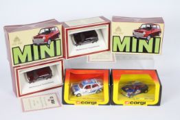 Corgi - 4 boxed Mini and Metro models including rare dark blue Mini 1000 # 201,