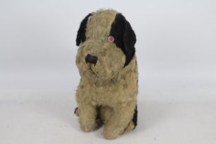 Unknown Maker - A large black and white sitting dog,