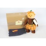 Steiff - A boxed white / brown mohair #00039 'Four Seasons Pumpkin Patch 1997' - The white bear has