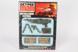 Geyper Man, Action Man - A boxed vintage Geyper Man Belt Fed Machine Gun 'Ametralladora Electrica'.