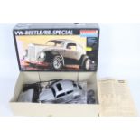 Monogram - A boxed 1:16 scale model car kit - Lot is a #77007 VW-Beetle/RR-Special.