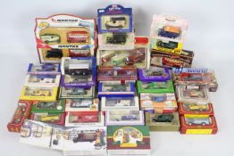 Lledo - A collection of 30 boxed die cast metal replica vans and delivery vehicles and 3 box sets