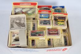 Lledo - A collection of 54 boxed die cast model delivery vans, cars service vehicles and similar.