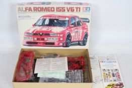 Tamiya - A boxed 1:24 scale model sports car kit - Lot is a #24137 Alfa Romeo I55 V6 TI.