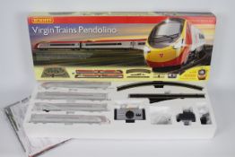 Hornby - A boxed Virgin Trains Pendolino Class 390 set # R1134 with power controller and TrakMat.