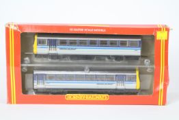 Hornby - A boxed OO gauge Class 142 Pacer Twin Railbus set in Regional Railways livery # R.103.