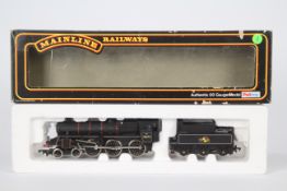 Mainline Railways - an OO gauge standard class model 4-6-0 locomotive and tender,
