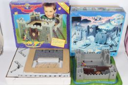 Britains - A boxed Knights Of The Sword Lion Castle # 7792 and a boxed Castle Set # 7793.