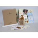 Steiff - A boxed miniature mohair 'Annual Gift 2002' bear - The antique look brown bear has plastic