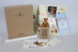 Steiff - A boxed miniature mohair 'Annual Gift 2002' bear - The antique look brown bear has plastic