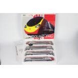 Dapol - A boxed OO gauge Virgin Pendolino set # D390-1.