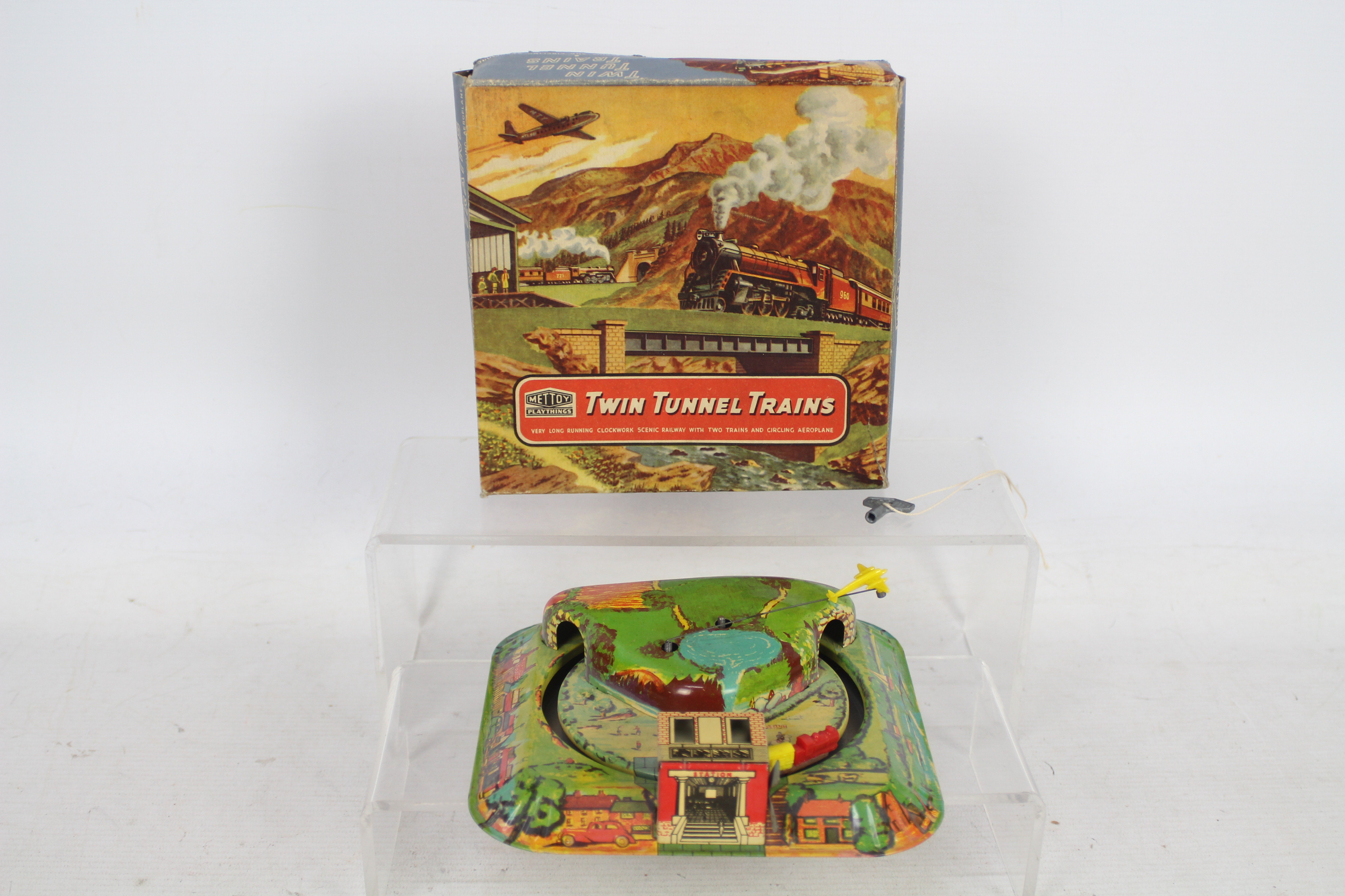 Mettoy - A clockwork Twin Tunnel Trains set with circling aeroplane # 6166.