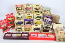 Lledo - A collection of 30 boxed die cast models and collectible die cast sets to include - Lledo