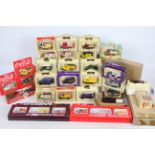 Lledo - A collection of 30 boxed die cast models and collectible die cast sets to include - Lledo