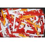 Scalextric - A box full of Scalextric trackside barriers in red, white and yellow.