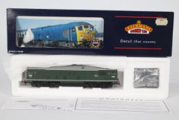 Bachmann - A boxed OO gauge Class 24 diesel loco in BR dark green livery operating number D5054.