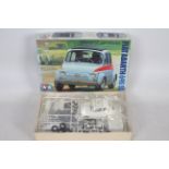 Tamiya - A boxed 1:24 scale model car - Lot is a #24173 Fiat Abarth 695 SS.