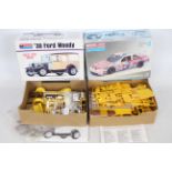 Monogram - 2 x boxed 1:24 scale model kits - Lot includes a #2432 #75 Dinner Bell Olds model kit,