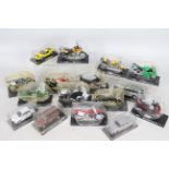 Maisto - A quantity of 16 x mostly Maisto die-cast model vehicles in plastic cases - Lot includes a