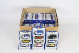 Oxford Die-Cast - A collection of 57 boxed die cast metal replica vans and delivery vehicles and