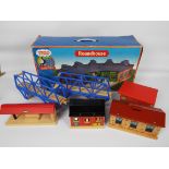 Thomas and Friends & Brio - A collection of wooden track buildings and accessories.