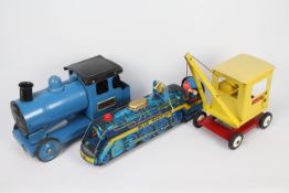 Tri-ang - Sutcliffe - Modern Toys - A vintage Tri-ang Express pull along locomotive.