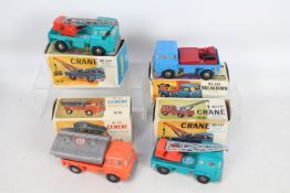 NN Toys - A collection of 4 boxed Bedford TK friction drive trucks, a Cement Tipper # 503,