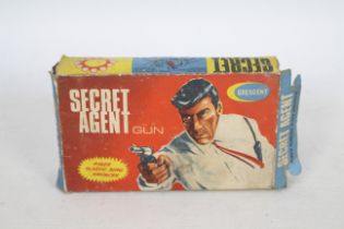 Crescent - A boxed Crescent Secret Agent Gun in the early style box # 136.